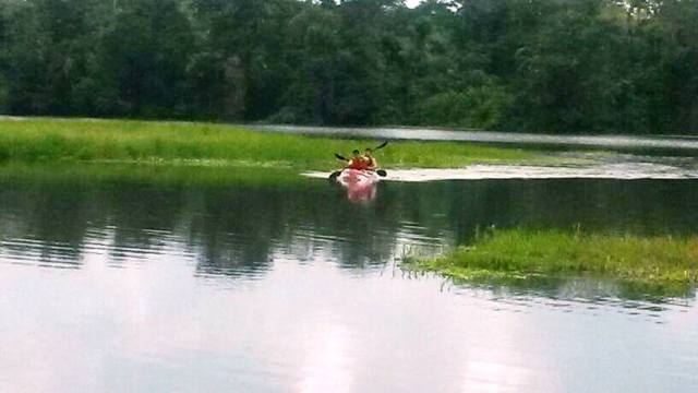 Kayaking on lagoon at Lirio Lodge Costa Rica