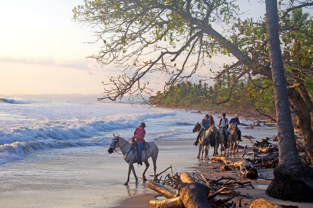 Horseback riding on Santa Teresa Beach Costa Rica