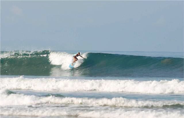 Surfing the waves at Santa Teresa, Costa Rica
