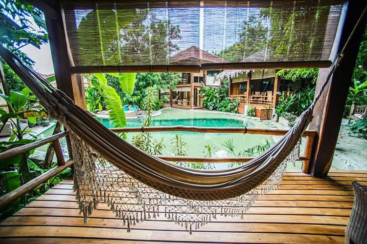 Hammock time at Pranamar Oceanfront Villas and Yoga Retreat, photo credit pranamarvillas.