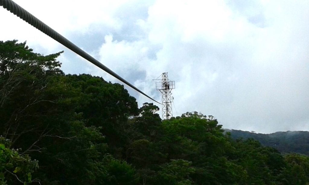 Flying Superman style over the could forest at El Establo Mountain Hotel