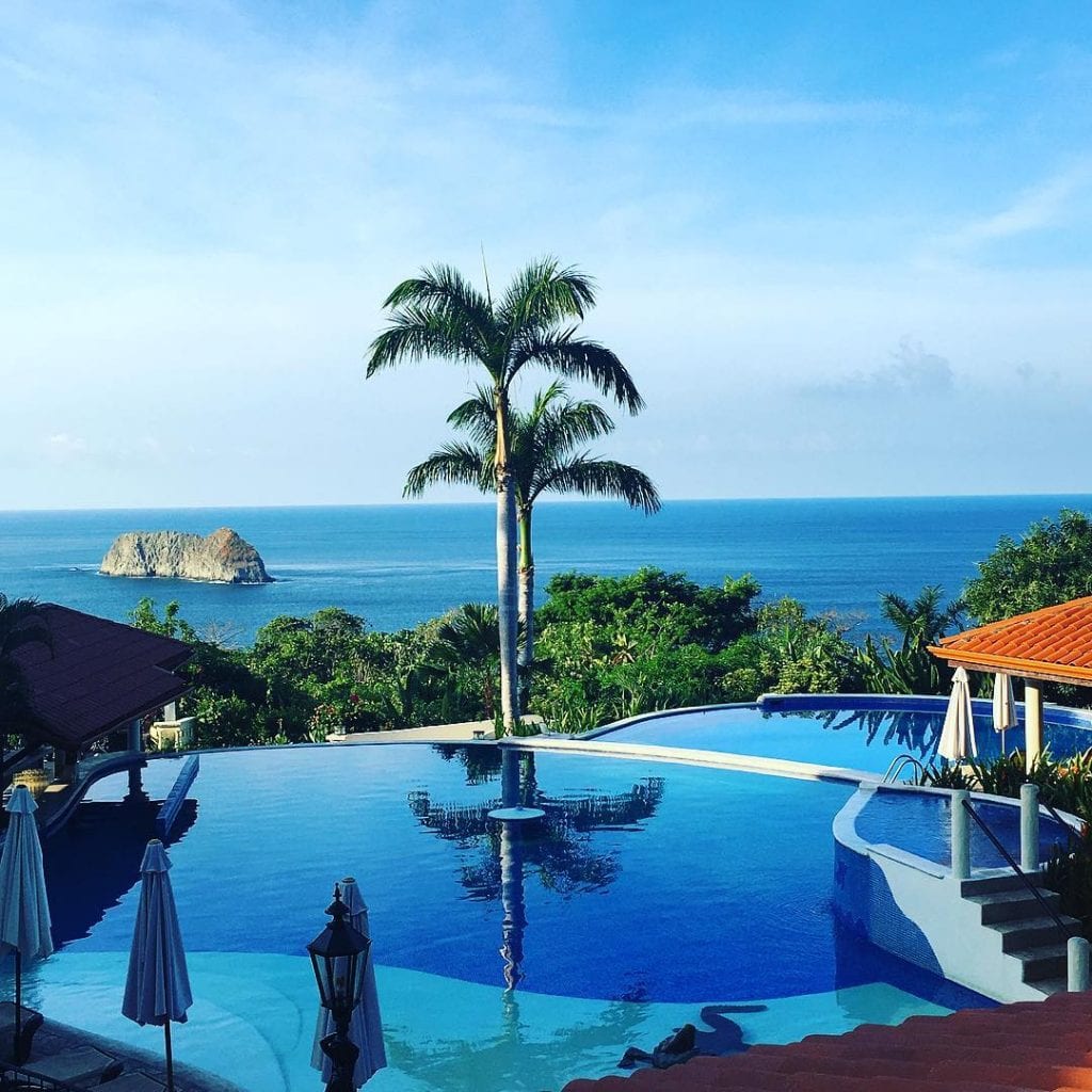 View of the pool and ocean from Hotel El Parador, Manuel Antonio. Photo credit saretmj.