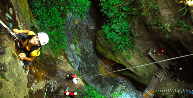 Adventure tour zip lining at Hacienda Guachipelin in Costa Rica
