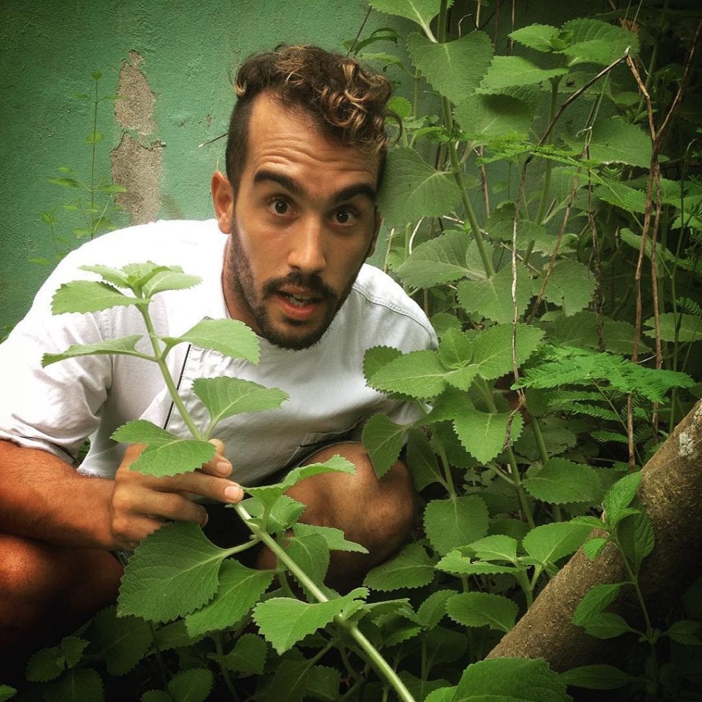 Luciano at his herb garden, photo by lucianoriotti.