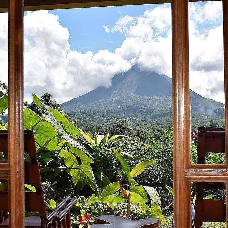 View of Arenal Volcano from Lost Iguana Resort, photo credit lostiguanaresort